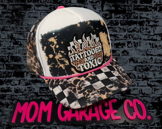 2. Tattooed & Toxic Trucker Hat